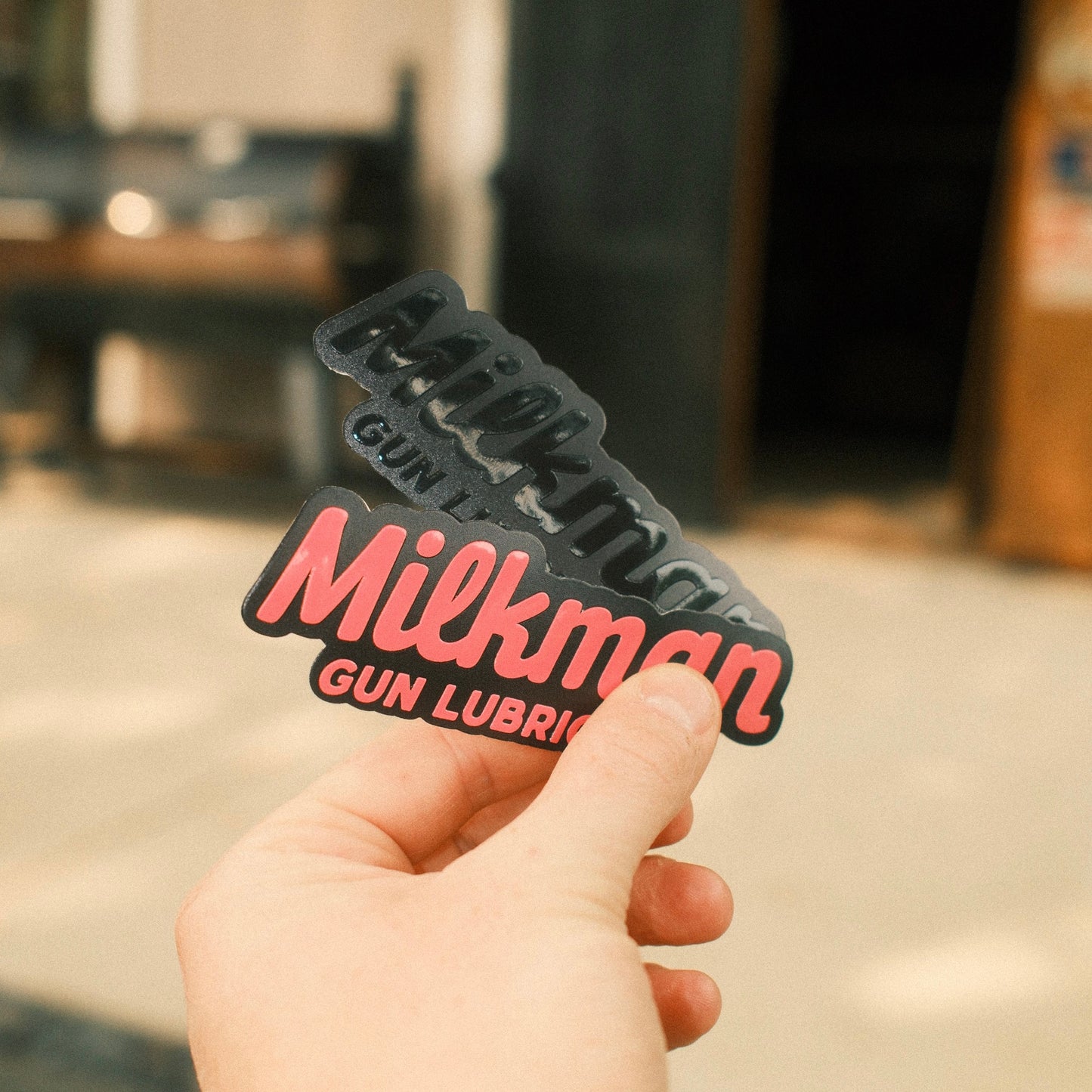 Embossed Black Logo Sticker