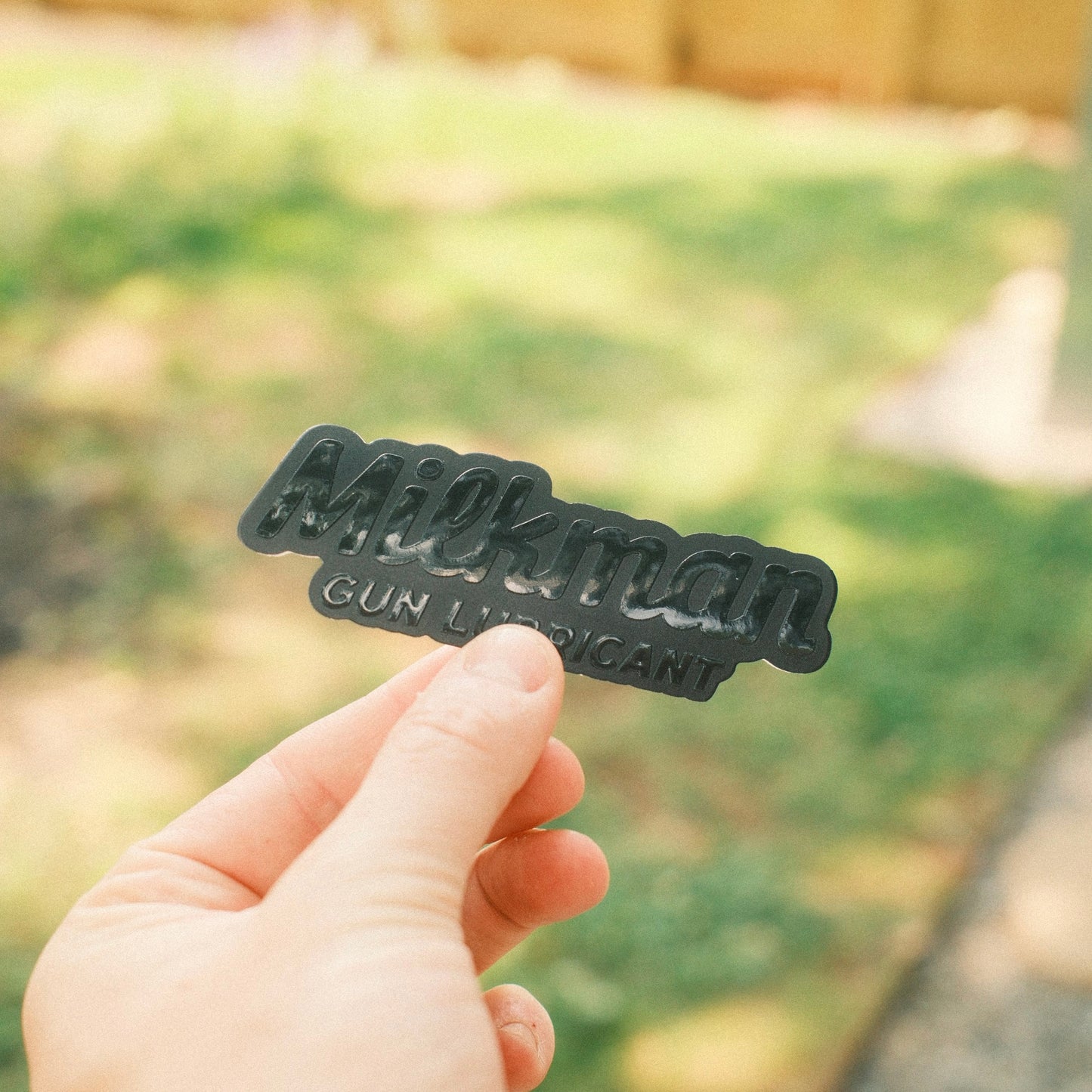 Embossed Black Logo Sticker